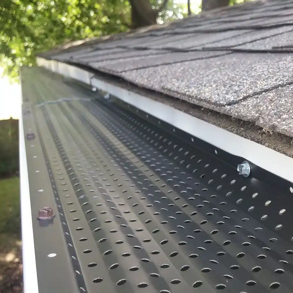 Gutter guards installed by Mr Goodroof Two men in a white van going to fix gutters for mr goodroof