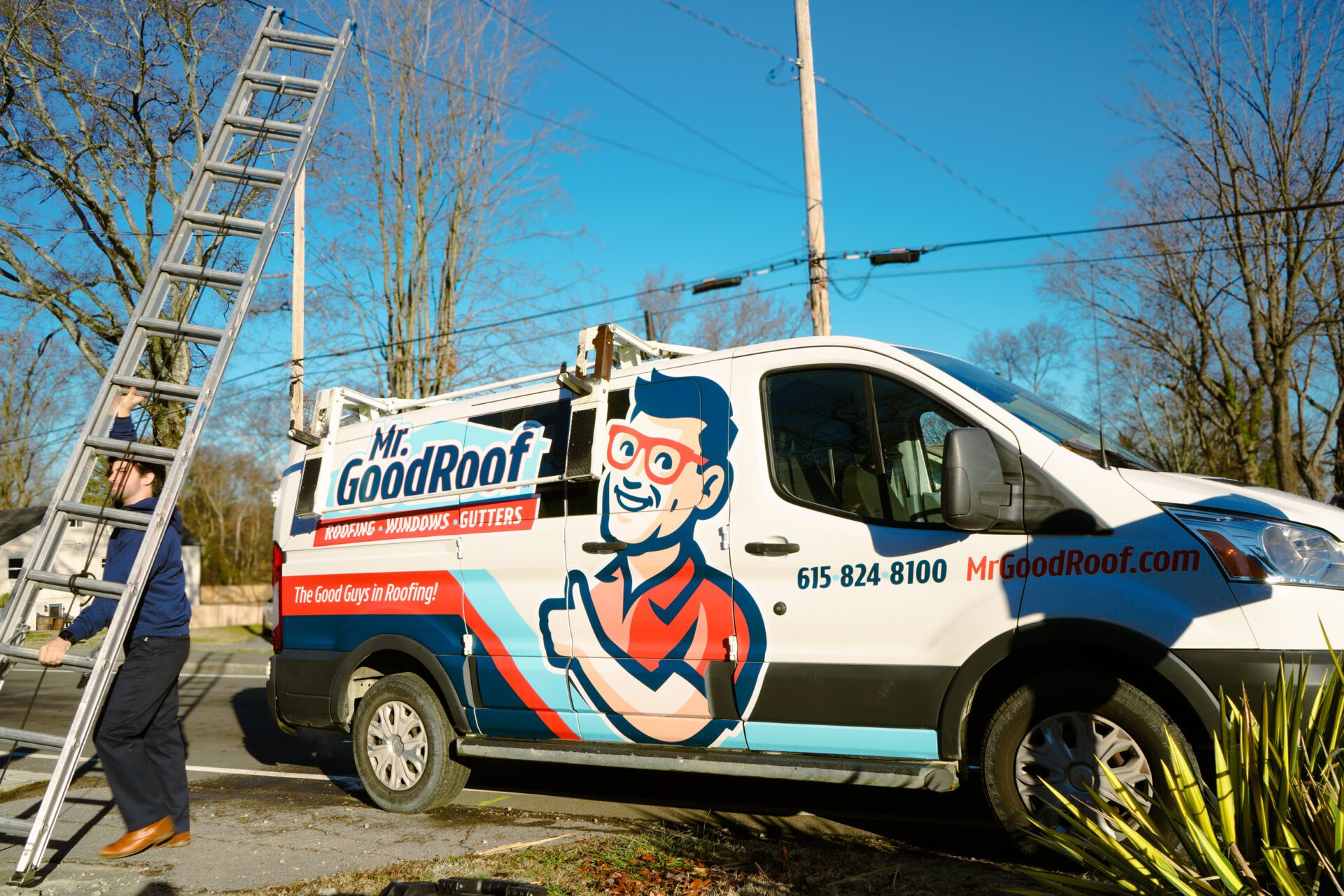 A white van with graphics for Mr Goodroof
