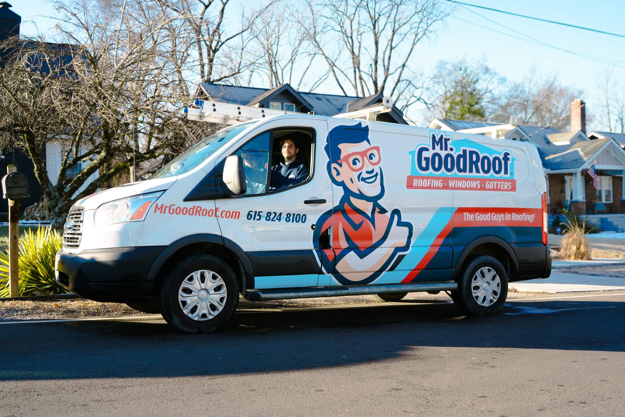 Two men in a white van