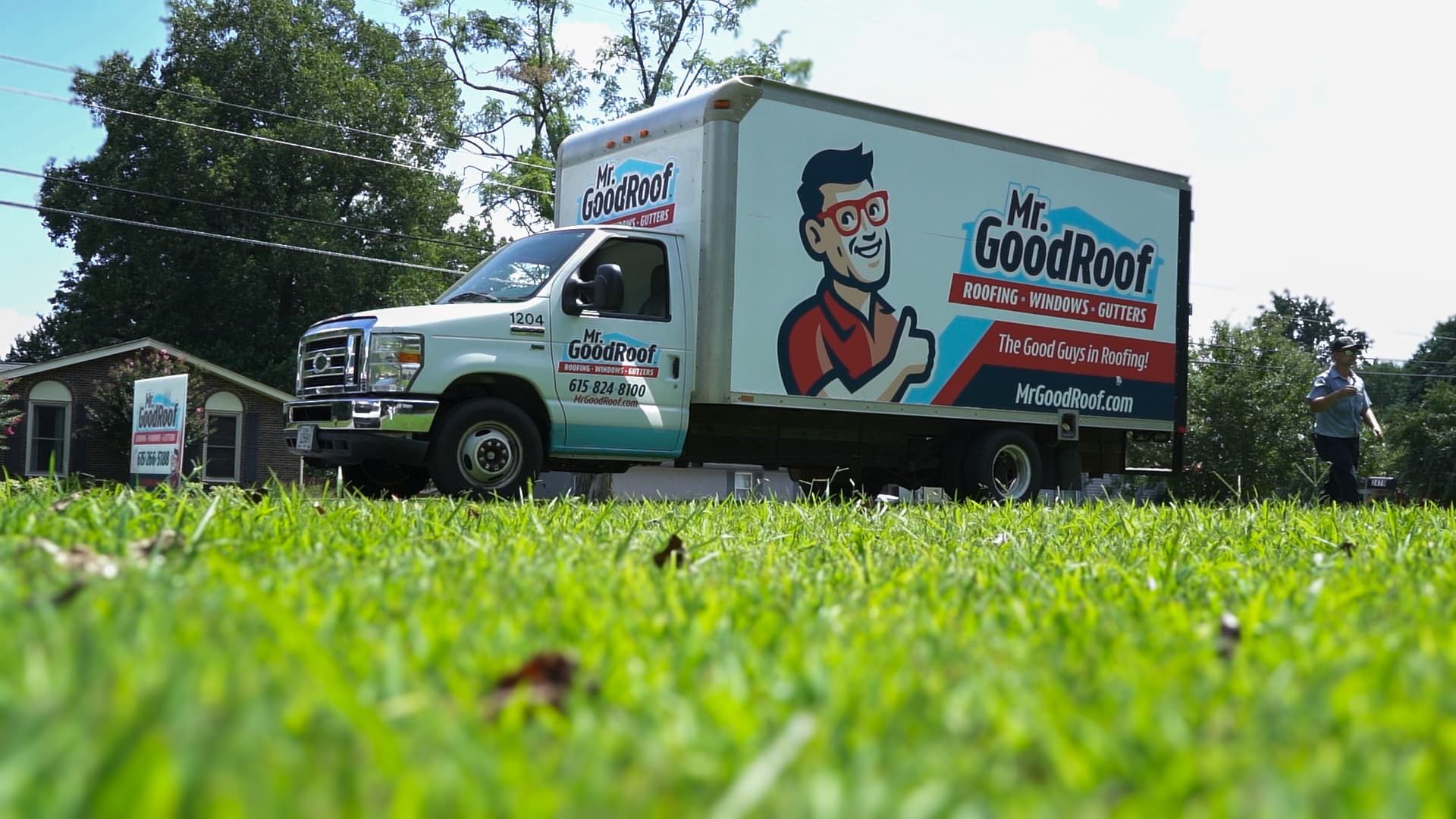 A white van with graphics for Mr Goodroof