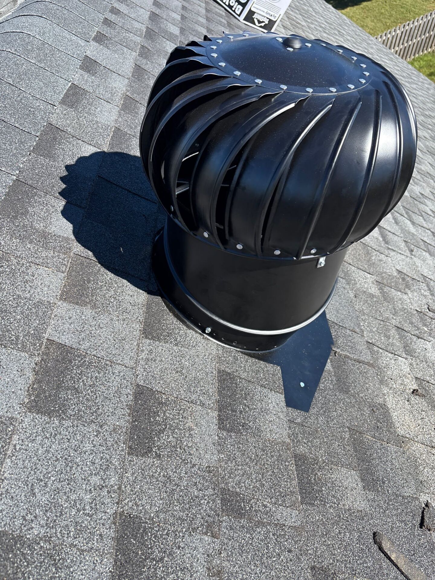 A man working on a roof for mr goodroof