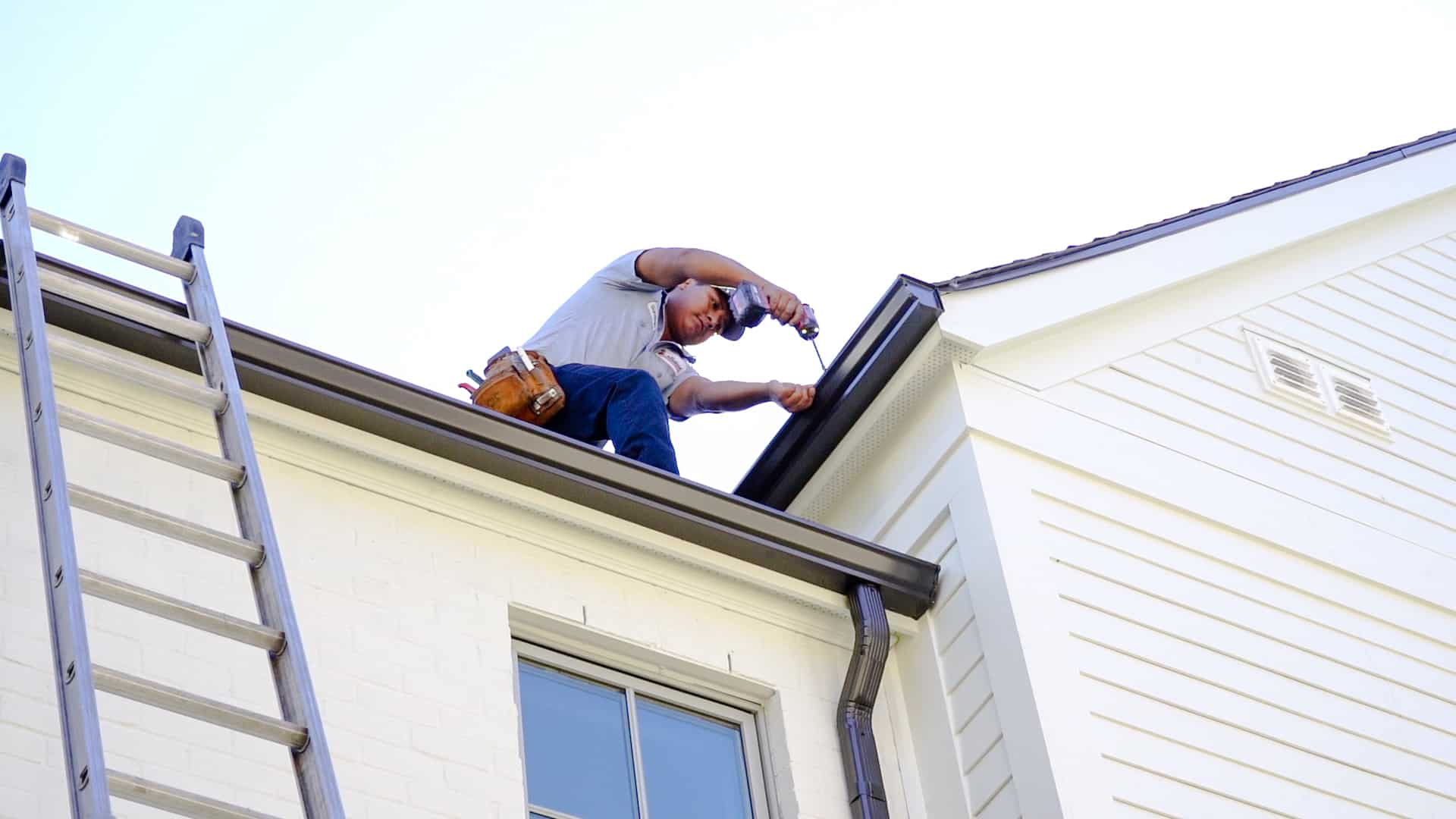 A mr goodroof technician on a roof in nashville tn