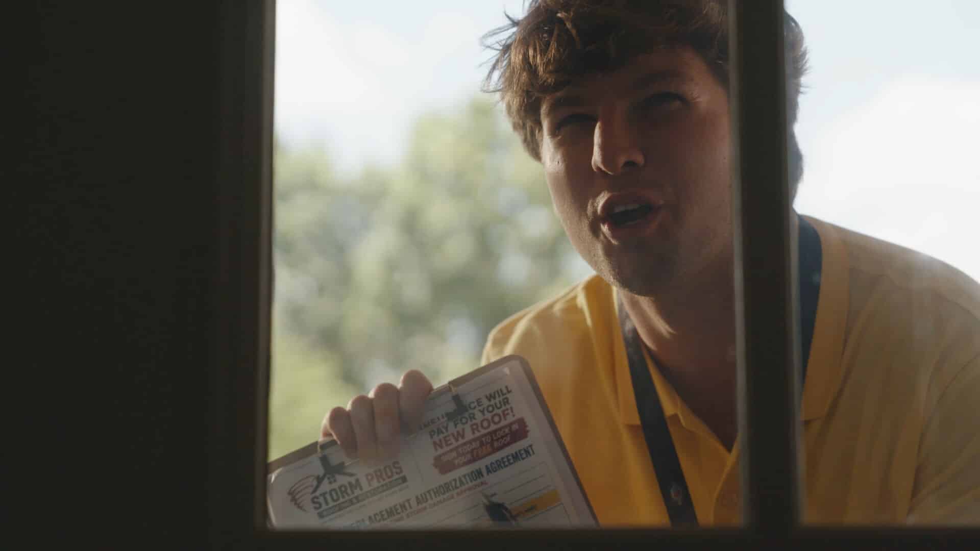 An annoying salesperson try to get in the door