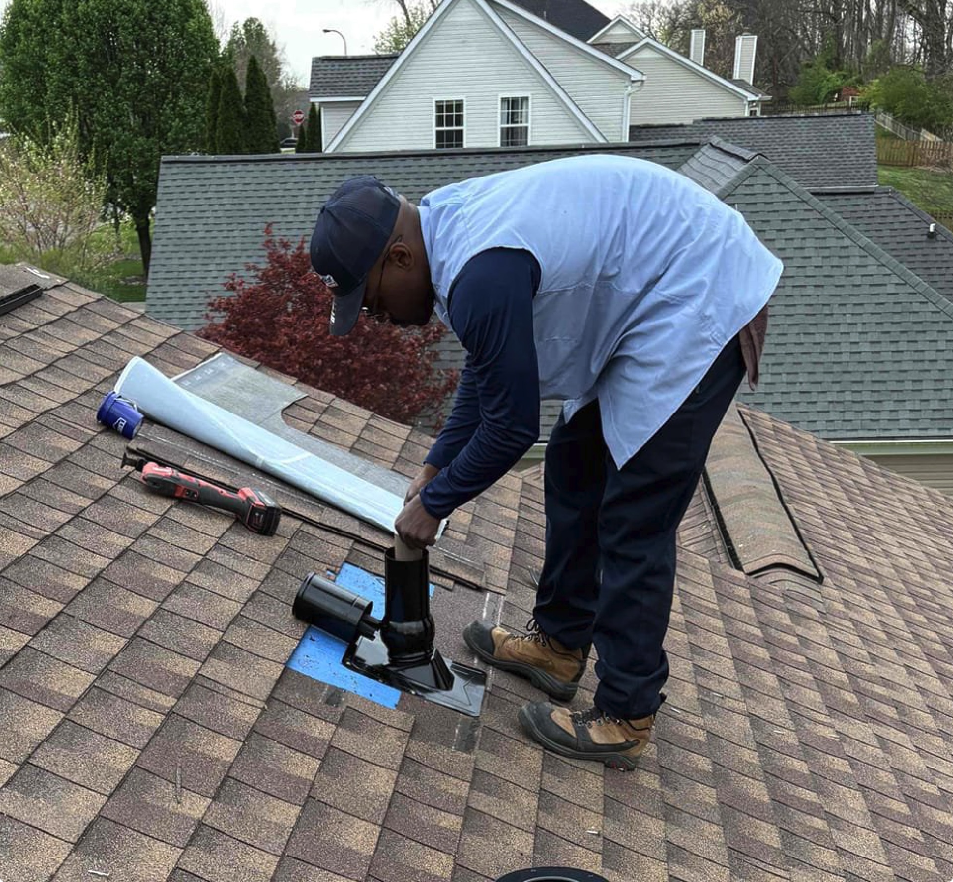 Pipe boot replacement by Mr. GoodRoof roof repair crew