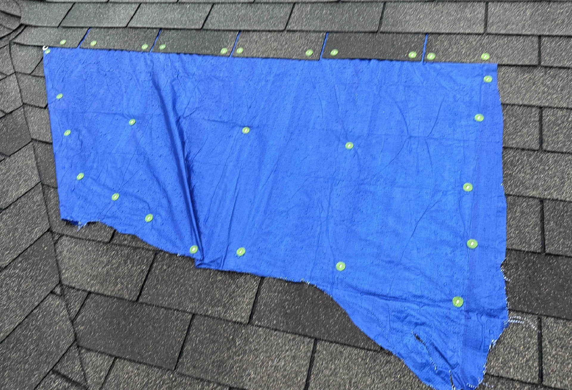 tarping on a roof