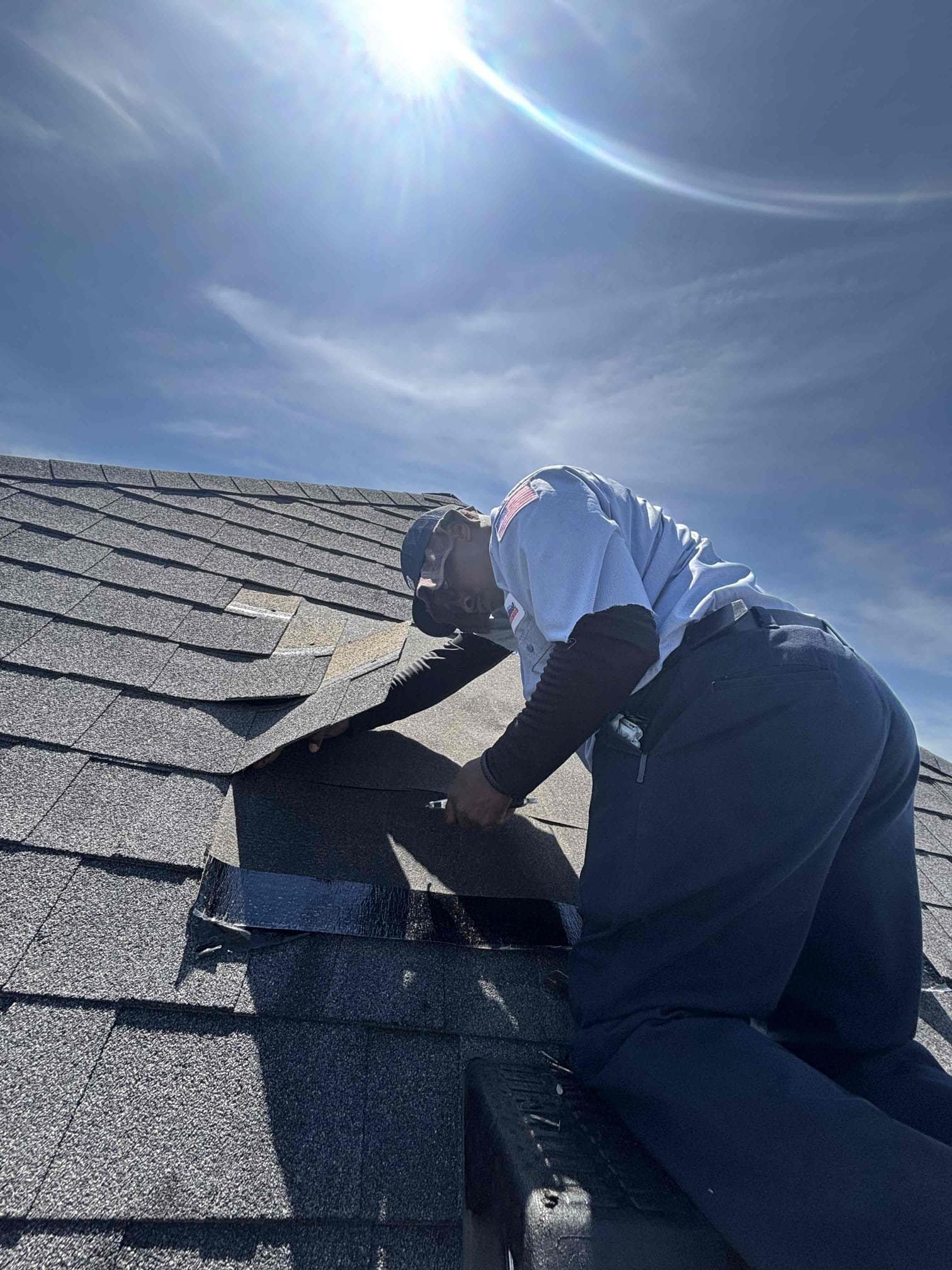 Mr. GoodRoof repair crew fixing storm damaged shingles in Hendersonville Tennessee