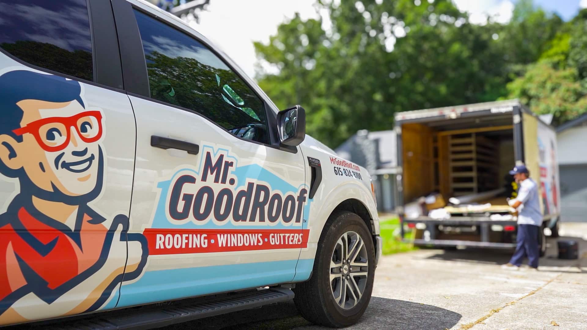 A mr goodroof truck in a driveway